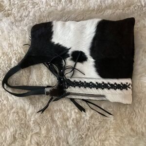 Handmade cowhide, leather shoulder purse with fringe